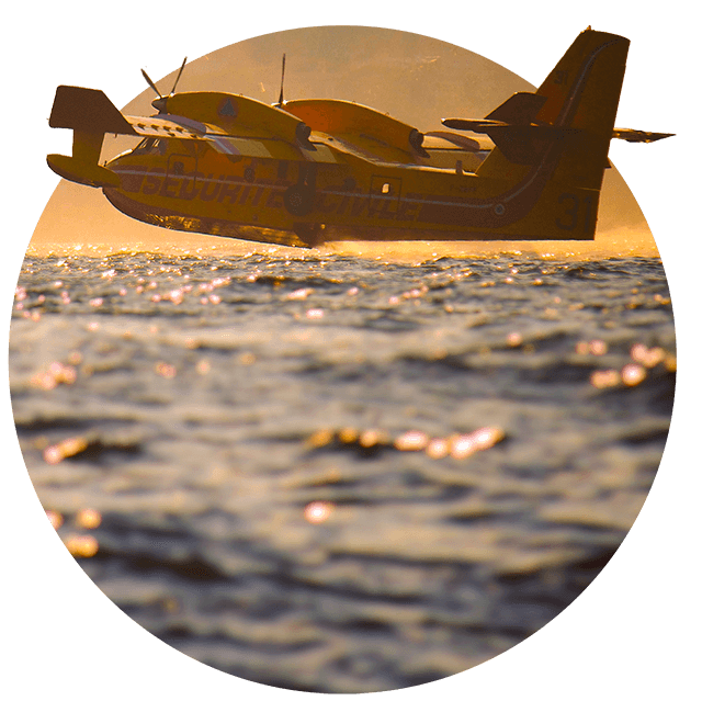Plane flying over the ocean